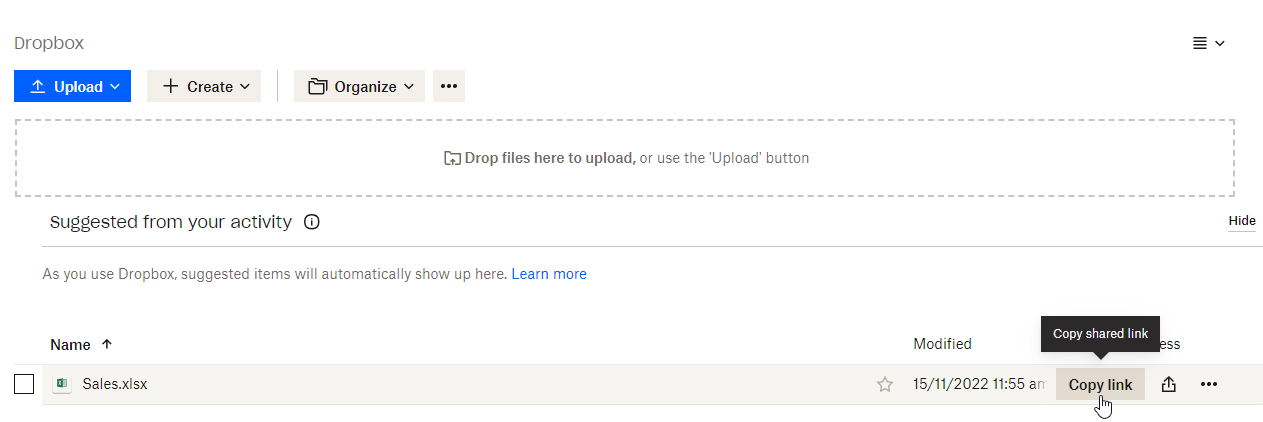 Dropbox file list with the cursor on the Copy link button next to the Sales.xlsx file